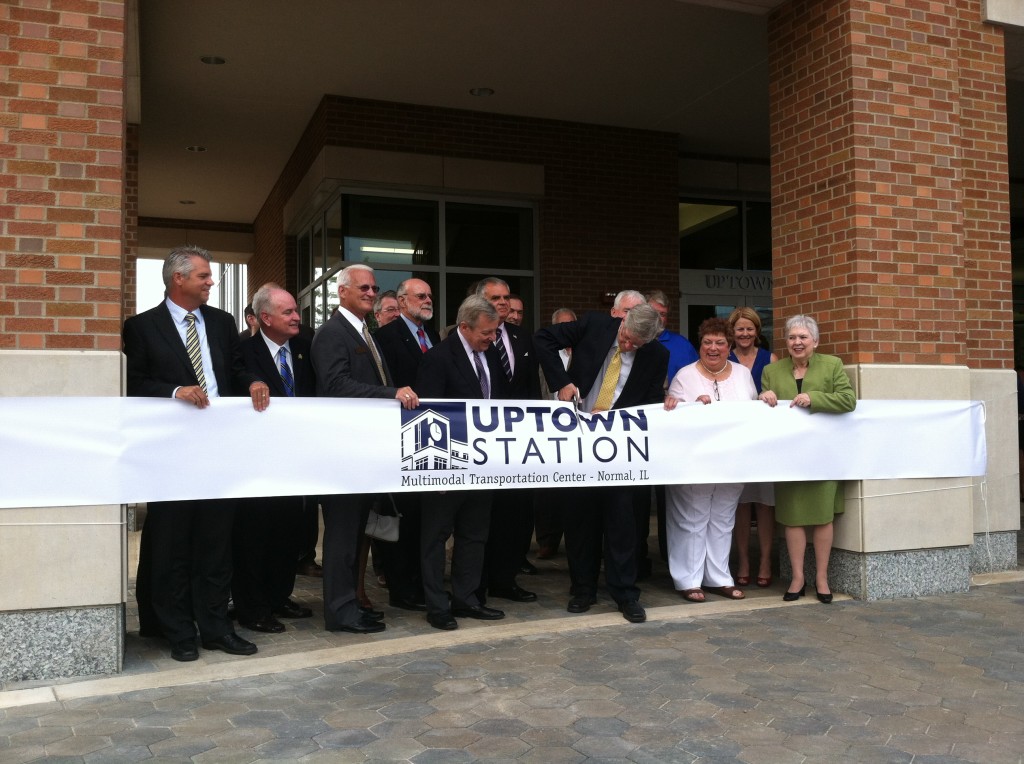 Mayor Koos cuts the ribbon on Uptown Station while accompanied by Transportation Secretary Ray LaHood (next on left) and Senator Dick Durbin (next on left). Sen Durbin was instrumental in supporting the project as well as repeatedly fighting to preserve funding for the TIGER grant program.