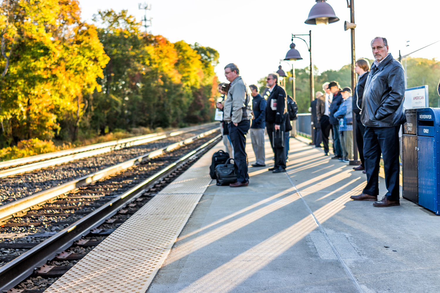 people waiting for a train