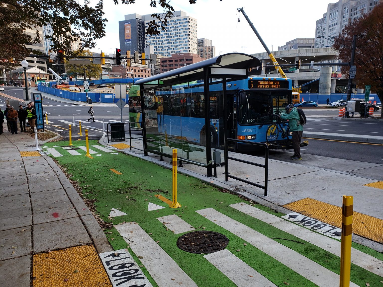 Transportation For America floating bus stop bike lane montgomery ...