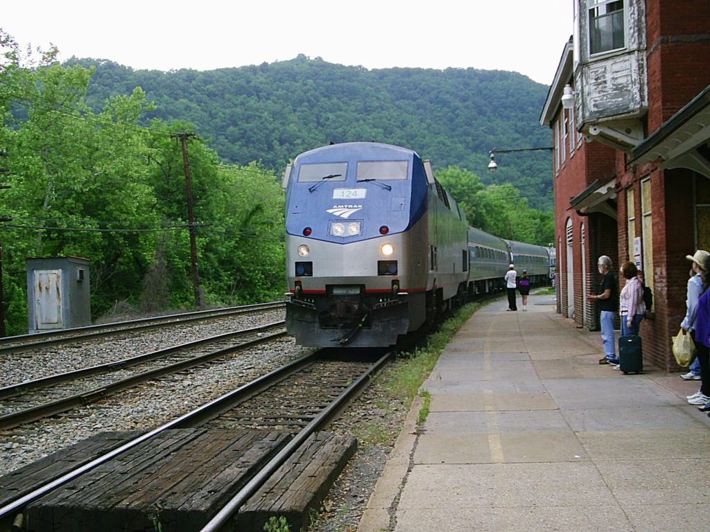 Amtrak train pulling into a station