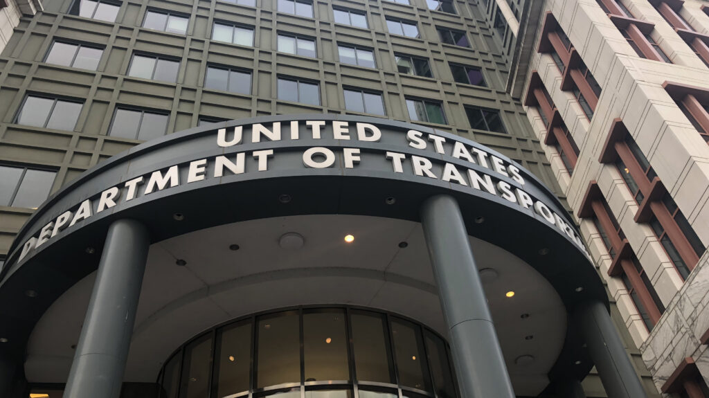 a view up at the facade of the USDOT headquarters building 