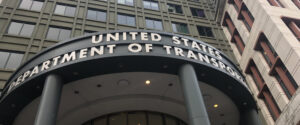 a view up at the facade of the USDOT headquarters building