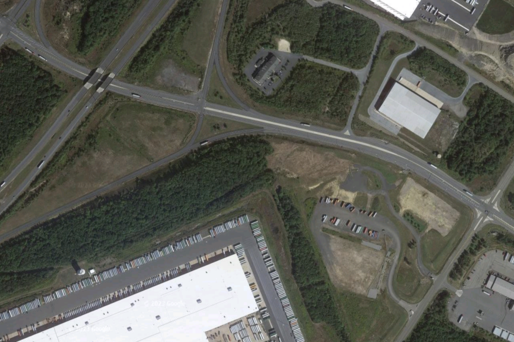 A google map aerial view of roads, trees, parking lots, and large warehouses off I-81 in Pennsylvania