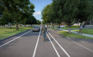 The Kensington Expressway is transformed into a grass-covered plain bordering a narrow street where cyclists and pedestrians can travel comfortably