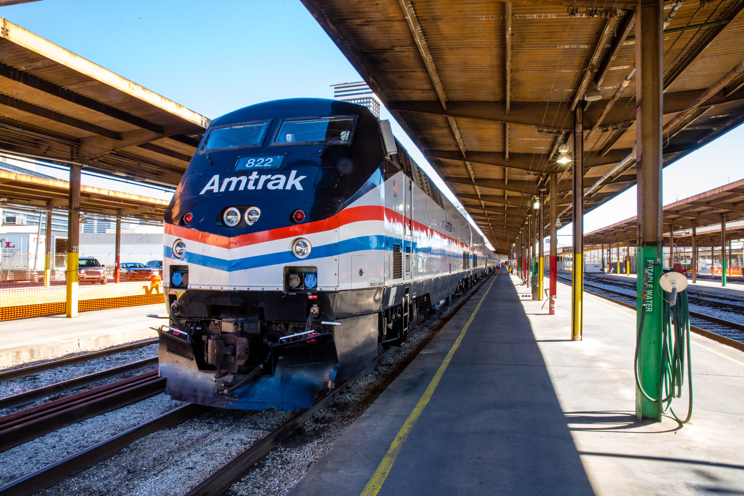 An Amtrak train waits at a station